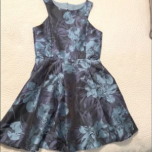 Girls size 10 special occasion floral dress. Never worn. Like new. Zunie